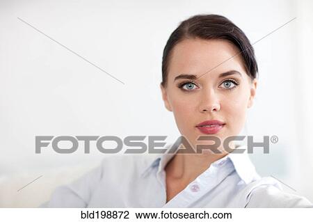 Stock Image - Portrait of serious woman. Fotosearch