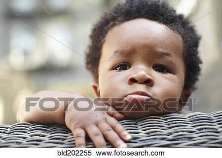 Stock Photography - Pouting African American baby. Fotosearch
