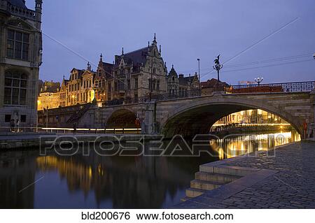 Quaint buildings in town at night View Large Photo Image Stock Photograph - Quaint buildings in town at night. Fotosearch