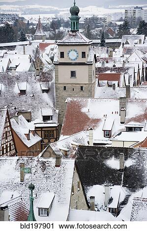 Stock Image - Quaint, snow covered village. Fotosearch