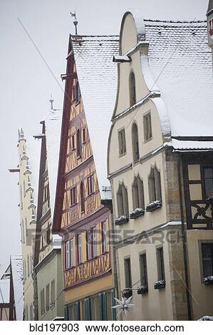 Stock Image - Quaint, snow covered village. Fotosearch