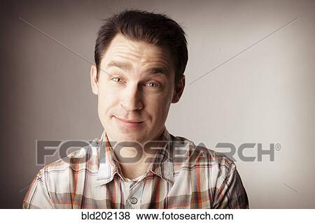 Questioning Caucasian man View Large Photo Image Stock Photo - Questioning Caucasian man. Fotosearch