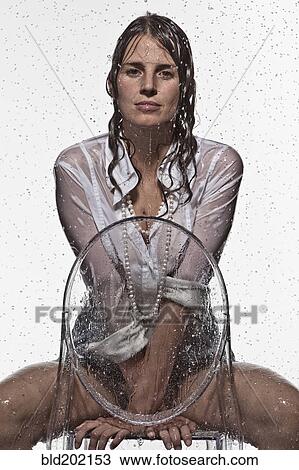 Rain falling on Caucasian businesswoman View Large Photo Image Stock Image - Rain falling on Caucasian businesswoman. Fotosearch