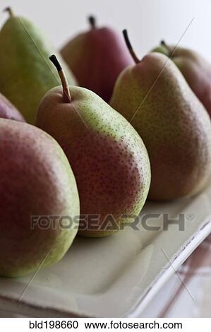Ripe pears on platter View Large Photo Image Stock Image - Ripe pears on platter. Fotosearch