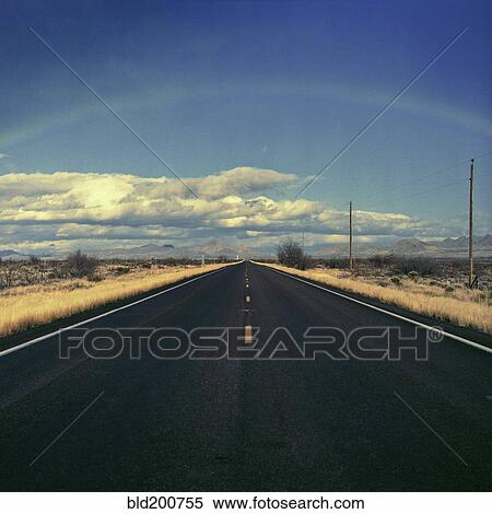 Stock Photography - Road through desert. Fotosearch
