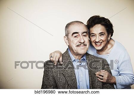 Senior couple hugging View Large Photo Image Stock Image - Senior couple hugging. Fotosearch