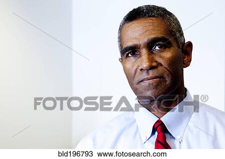 Stock Image - Serious African American businessman. Fotosearch