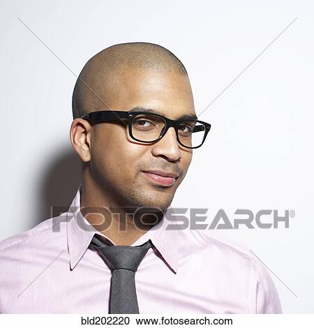 Stock Image - Serious businessman in eyeglasses. Fotosearch