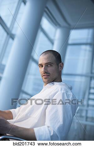 Stock Image - Serious Caucasian businessman. Fotosearch