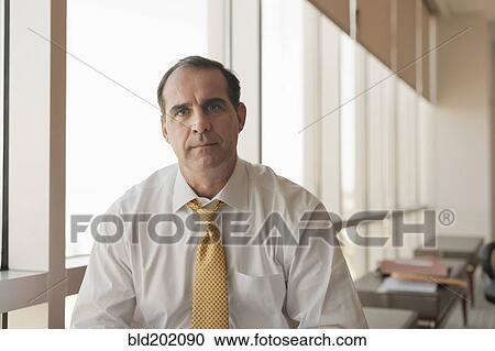 Serious Caucasian businessman View Large Photo Image Stock Image - Serious Caucasian businessman. Fotosearch