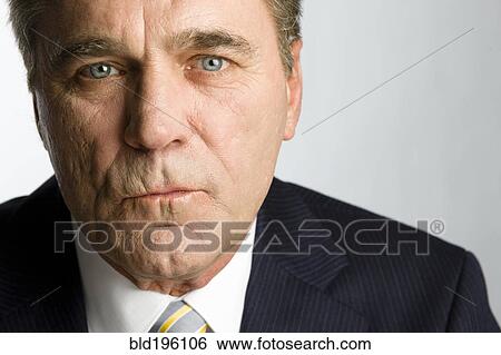 Stock Photograph - Serious Caucasian businessman. Fotosearch