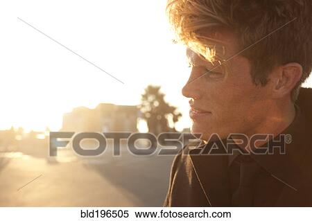 Serious Caucasian man outdoors View Large Photo Image Stock Photography - Serious Caucasian man outdoors. Fotosearch