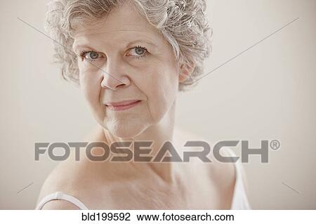 Stock Image - Serious Caucasian woman. Fotosearch