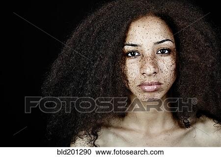 Serious, freckled mixed race woman View Large Photo Image Stock Image - Serious, freckled mixed race woman. Fotosearch