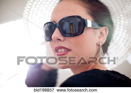Stock Photo - Serious, glamorous Caucasian woman. Fotosearch