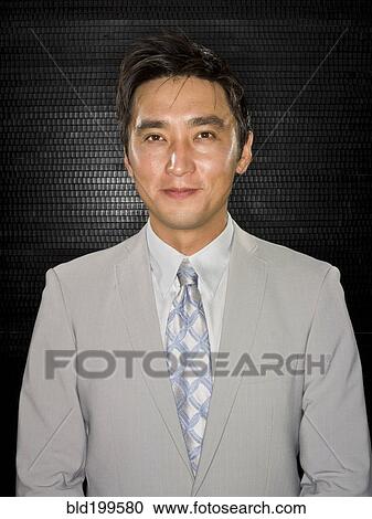 Serious Japanese businessman View Large Photo Image Stock Image - Serious Japanese businessman. Fotosearch