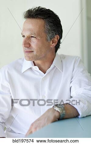 Serious man thinking View Large Photo Image Picture - Serious man thinking. Fotosearch