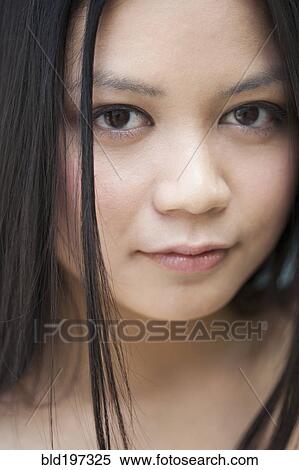 Serious Vietnamese woman View Large Photo Image Stock Photography - Serious Vietnamese woman. Fotosearch