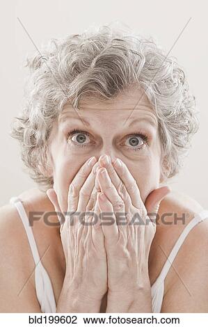 Stock Image - Shocked Caucasian woman. Fotosearch