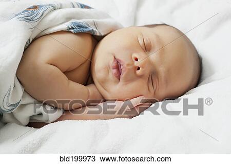 Stock Image - Sleeping baby boy. Fotosearch