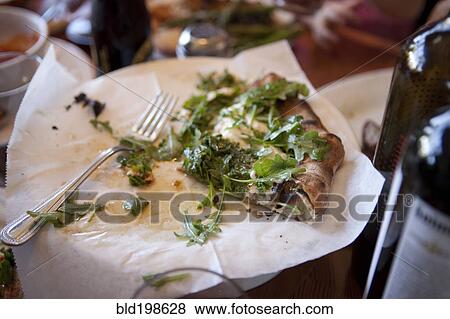 Slice of arugula pizza View Large Photo Image Stock Photo - Slice of arugula pizza. Fotosearch