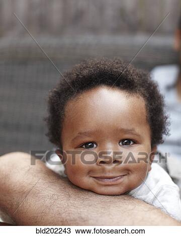 Stock Image - Smiling African American baby. Fotosearch