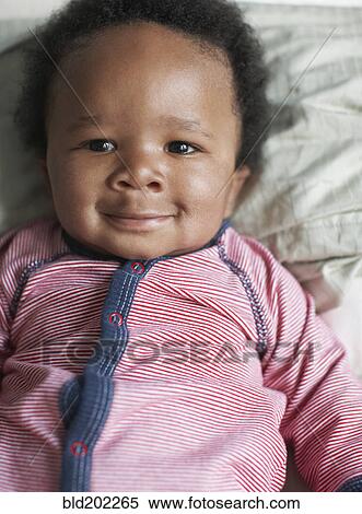 Stock Photography - Smiling African American baby. Fotosearch