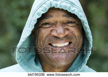 Smiling African American man in hoody View Large Photo Image Stock Photograph - Smiling African American man in hoody. Fotosearch