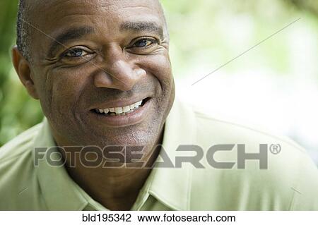 Stock Image - Smiling African American man. Fotosearch