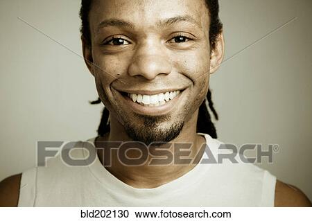 Stock Image - Smiling African American man. Fotosearch