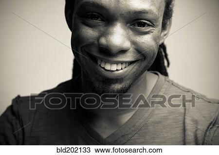 Stock Image - Smiling African American man. Fotosearch