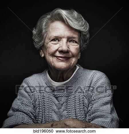 Stock Image - Smiling, aging Caucasian woman. Fotosearch