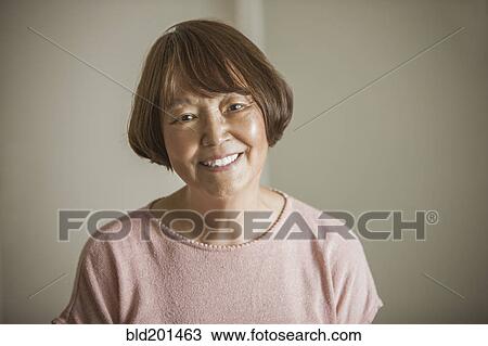 Smiling Asian woman View Large Photo Image Stock Image - Smiling Asian woman. Fotosearch