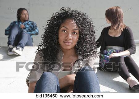 Stock Image - Smiling Black teenage girl. Fotosearch