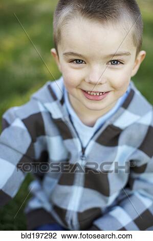 Stock Image - Smiling Caucasian boy. Fotosearch