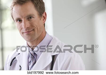 Stock Image - Smiling Caucasian doctor. Fotosearch