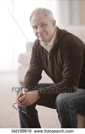 Stock Photograph - Smiling Caucasian man. Fotosearch