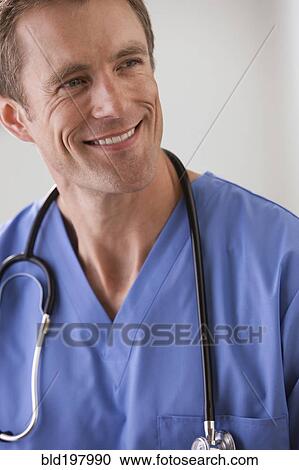 Stock Image - Smiling Caucasian surgeon. Fotosearch