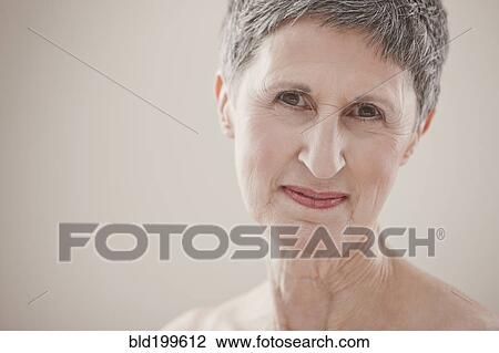 Stock Image - Smiling Caucasian woman. Fotosearch