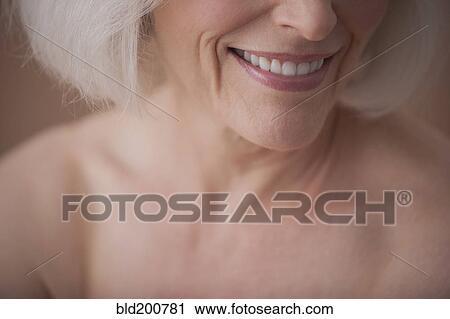 Stock Image - Smiling Caucasian woman. Fotosearch