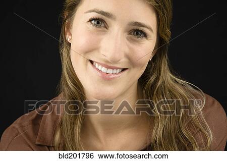 Stock Photograph - Smiling Caucasian woman. Fotosearch