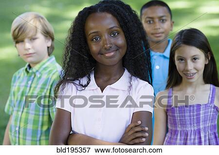 Stock Photo - Smiling children outdoors. Fotosearch