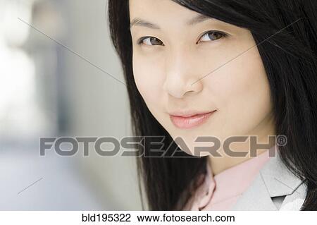 Smiling Chinese businesswoman View Large Photo Image Stock Image - Smiling Chinese businesswoman. Fotosearch