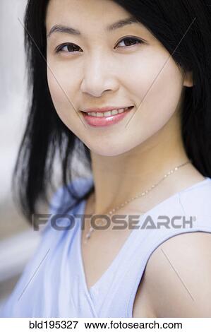 Stock Photo - Smiling Chinese businesswoman. Fotosearch