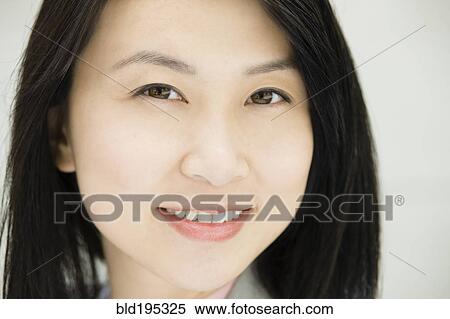 Smiling Chinese businesswoman View Large Photo Image Stock Photography - Smiling Chinese businesswoman. Fotosearch