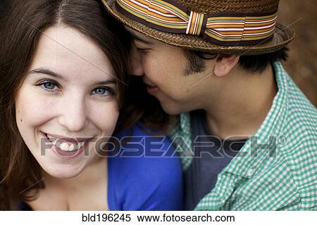Smiling couple hugging View Large Photo Image Stock Photography - Smiling couple hugging. Fotosearch