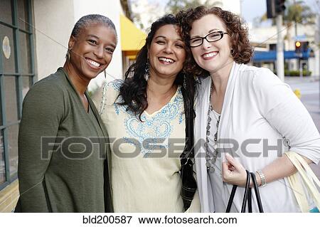 Smiling friends View Large Photo Image Stock Photo - Smiling friends. Fotosearch