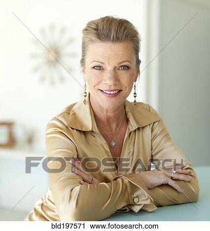 Stock Image - Smiling glamorous Caucasian woman. Fotosearch