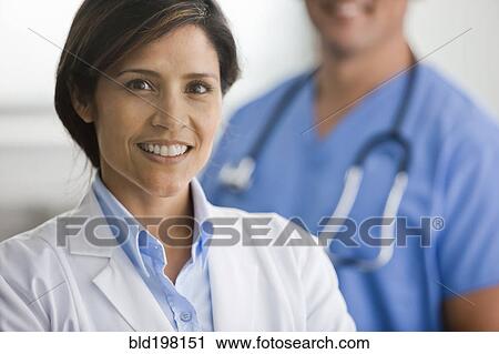 Smiling hispanic doctor View Large Photo Image Stock Image - Smiling hispanic doctor. Fotosearch