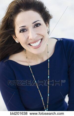 Smiling Hispanic woman View Large Photo Image Stock Photo - Smiling Hispanic woman. Fotosearch